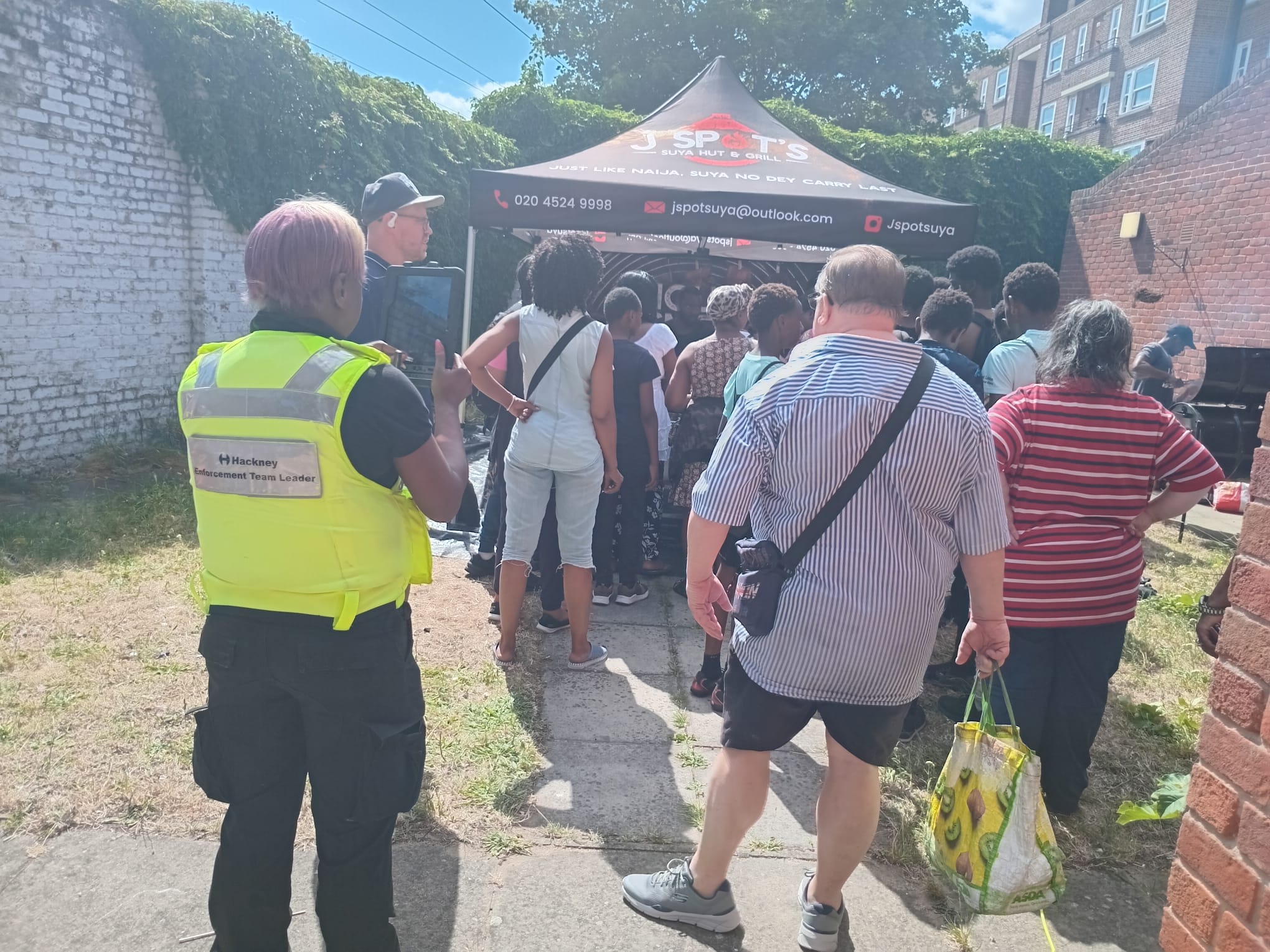 Families and partners gathering outside Nisbet Community Hall